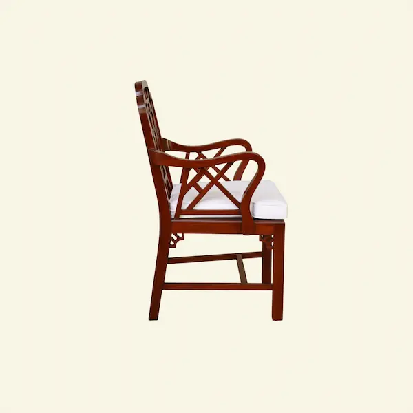 Side view of Ashford Chippendale Armchair highlighting lattice fretwork and seat cushion