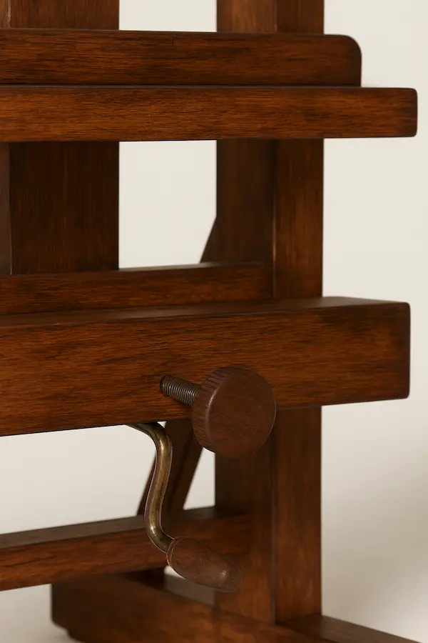 Close-up detail of brass screw device on Savile Adjustable Artist’s Easel in American Oak