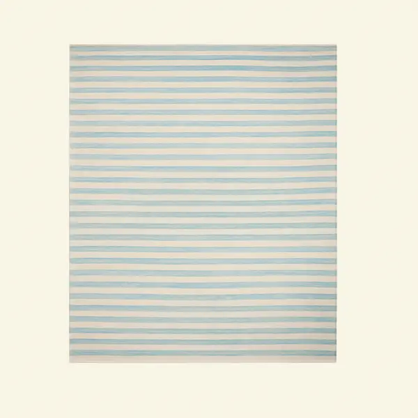 Handwoven blue and ivory stripe wool flatweave rug, low-pile kilim texture with bound edges, Reeva Sethi Home