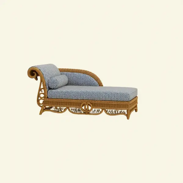 Handwoven Savannah Wicker Chaise Lounge with intricate rattan frame and blue geometric upholstery, catalog view on a neutral background.