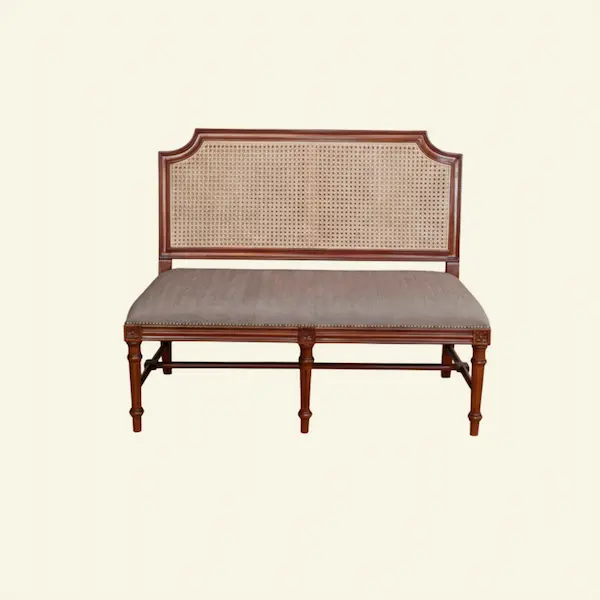 Versailles Cane Settee with handwoven cane back and upholstered seat in French Linen Ivory background