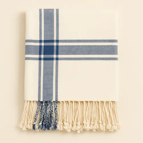 Blue and White Woven Check Cotton Blanket neatly folded with fringes