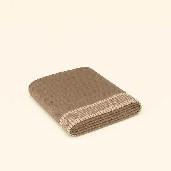 Highland Wool-Cotton Hemmed Throw folded neatly, taupe with cream hemmed edges, luxury wool-cotton blend.